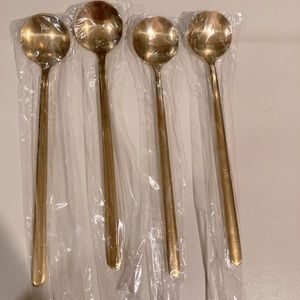 Set of 4 gold spoons brand new un-used